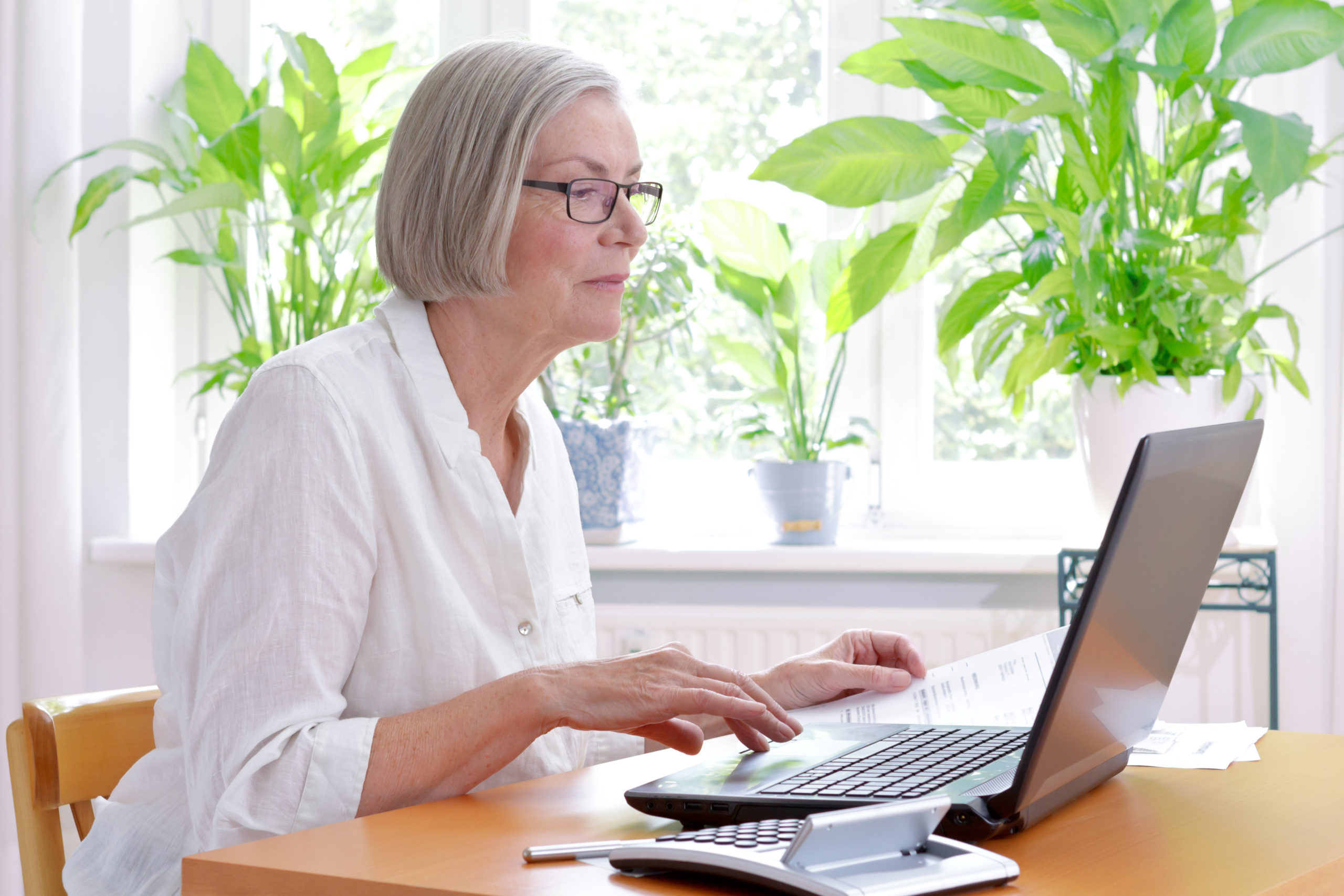 Mature woman at computer