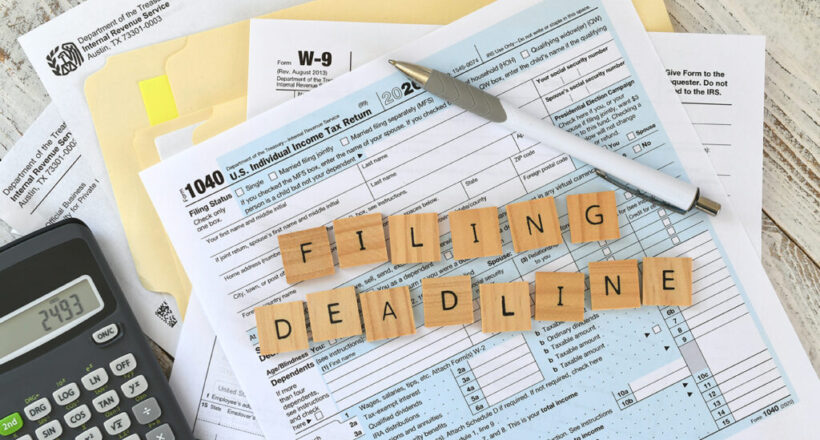 irs-tax-forms-1040-words-filing-deadline-in-wooden-2023-11-27-05-23-30-utc