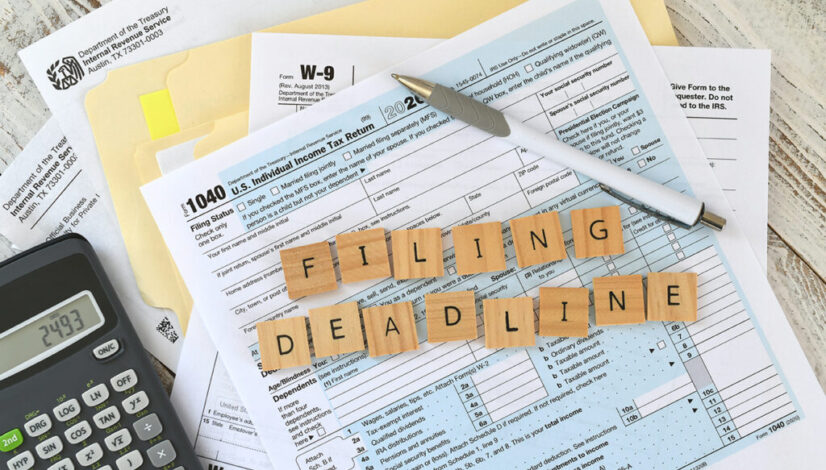 irs-tax-forms-1040-words-filing-deadline-in-wooden-2023-11-27-05-23-30-utc